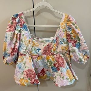 Floral peplum top with puff sleeves